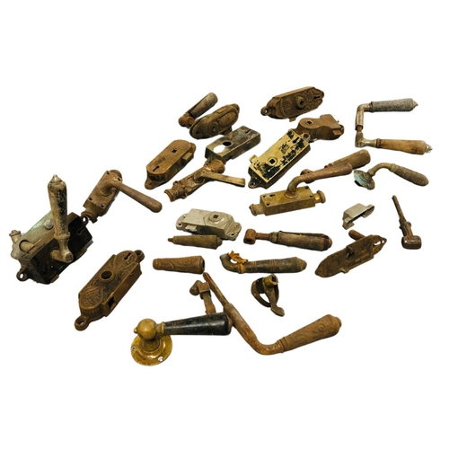 703 - Collection of Victorian brass door handles and accessories