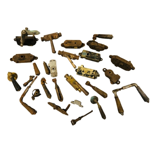 703 - Collection of Victorian brass door handles and accessories