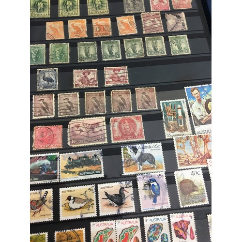 268 - 4 x Stamp Albums - British and Colonial and Worldwide - to include Winston Churchill, Kuwait post Ma... 