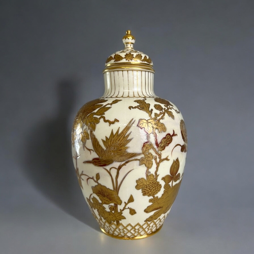 100A - Royal Crown Derby porcelain lidded vase.Gilded Japonesque design.Date marks to 1886. Later replaceme... 