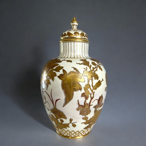 100A - Royal Crown Derby porcelain lidded vase.Gilded Japonesque design.Date marks to 1886. Later replaceme... 