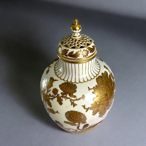 100A - Royal Crown Derby porcelain lidded vase.Gilded Japonesque design.Date marks to 1886. Later replaceme... 