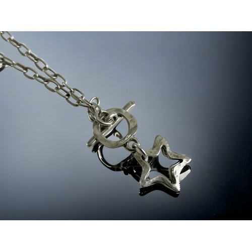 535 - Necklace with integral stars pendant. Bu Danon jewellery.