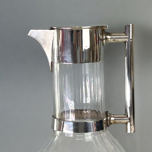 453 - Christopher Dresser (1834-1904) sterling silver mounted cut glass Claret jug.John Grinsell & son... 