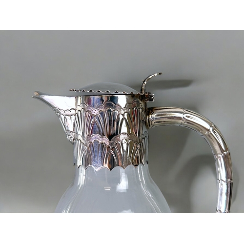 454 - Christopher Dresser style Edward Hutton silver mounted Claret jug.London, 1892 hallmarks.Stylised de... 