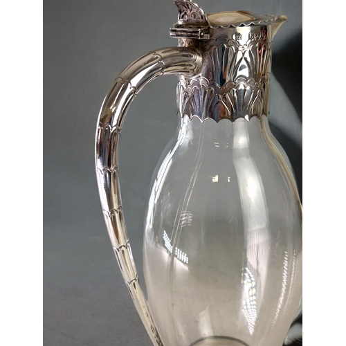 454 - Christopher Dresser style Edward Hutton silver mounted Claret jug.London, 1892 hallmarks.Stylised de... 