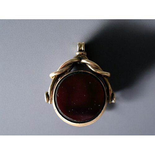 545 - A 10ct Gold, Carnelian & bloodstone swivel watch fob.26 x 22mm