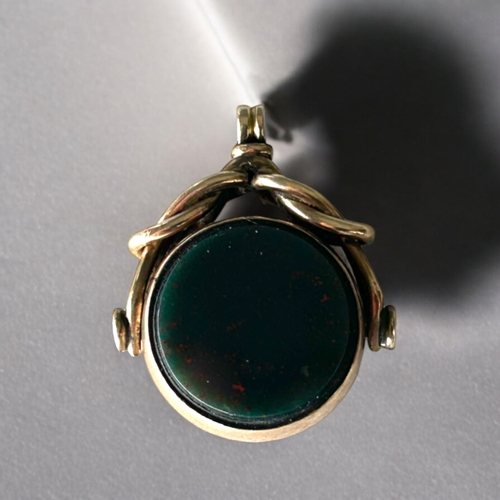 545 - A 10ct Gold, Carnelian & bloodstone swivel watch fob.26 x 22mm