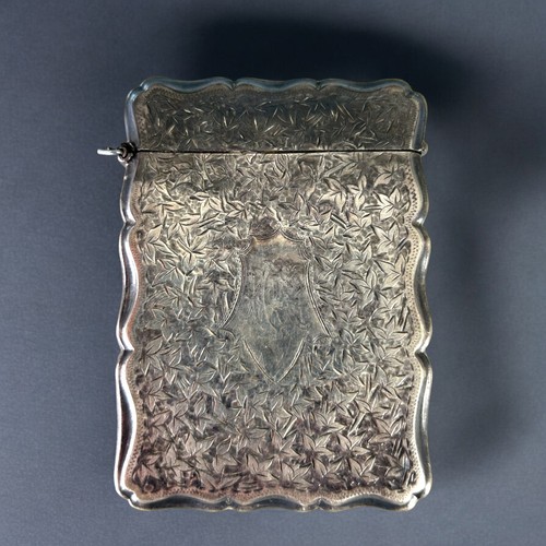 123 - A Victorian sterling Silver card case.Birmingham, 1896 hallmarks. Together with a gold filled Eversh... 