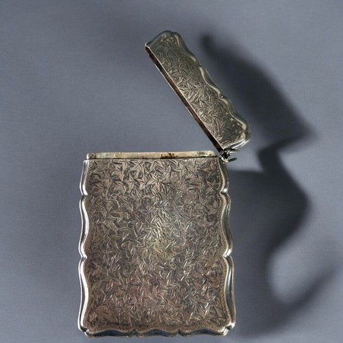 123 - A Victorian sterling Silver card case.Birmingham, 1896 hallmarks. Together with a gold filled Eversh... 