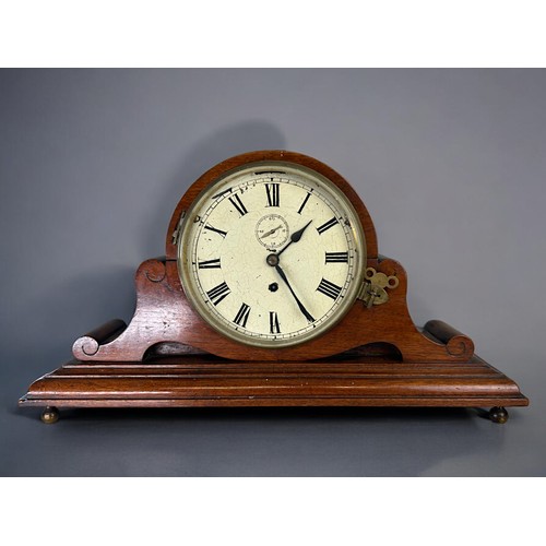 512 - A large Carved Oak frame napoleon shape mantle clock.19th century.Large enamel dial with black roman... 