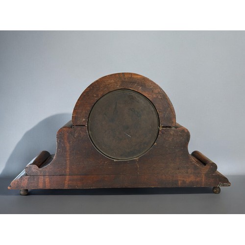 512 - A large Carved Oak frame napoleon shape mantle clock.19th century.Large enamel dial with black roman... 