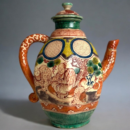 20 - A Japanese Banko ware wine ewer.Edo period, 19th century.Hand painted Scholars & young servant. ... 