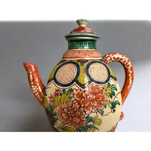 20 - A Japanese Banko ware wine ewer.Edo period, 19th century.Hand painted Scholars & young servant. ... 