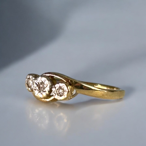 548 - A ladies 10ct Gold & Diamond ring.Size - KWeight - 1.26