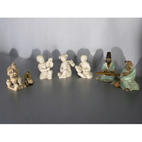 92 - A collection of Chinese figures.Including three Chinese revolution blanc-de-chine musician figures.... 