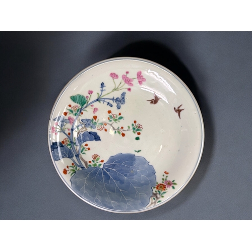 22 - A Japanese Nabeshima porcelain dish.Edo/Meiji period, 19th century.Leaf & flowers pattern in und... 