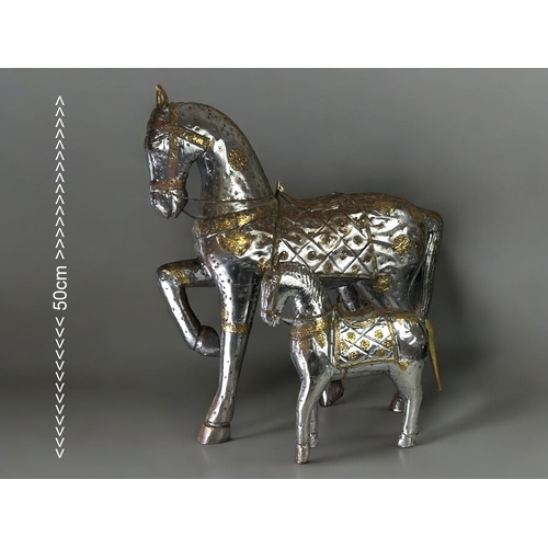 76 - A large Indian metal applique horses.Together with a small example.Larger - 50 x 45cm