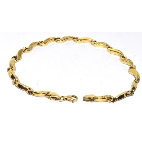 554 - 9ct gold twin colour bracelet 19cm 3.4g