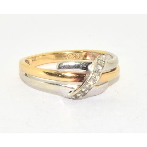 556 - 9ct gold ladies twin colour gold and  Diamond ring hallmarked as diamond size M