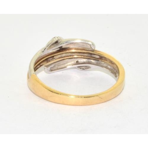 556 - 9ct gold ladies twin colour gold and  Diamond ring hallmarked as diamond size M