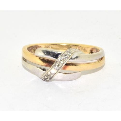 556 - 9ct gold ladies twin colour gold and  Diamond ring hallmarked as diamond size M