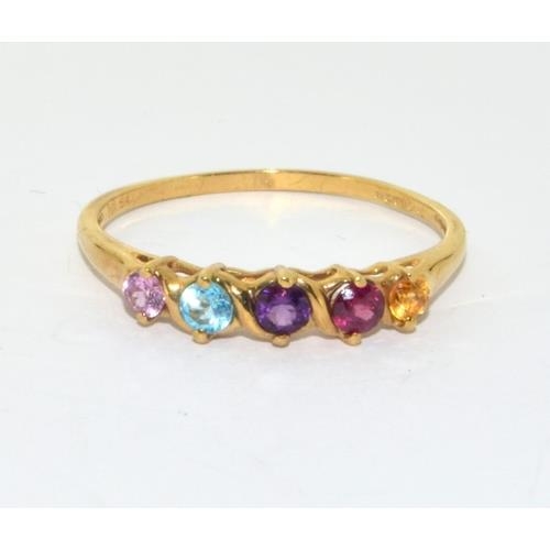 561 - 9ct gold ladies semi precious stone ring set with Ruby, Amber , Garnet Aquamarine, and Tourmaline si... 