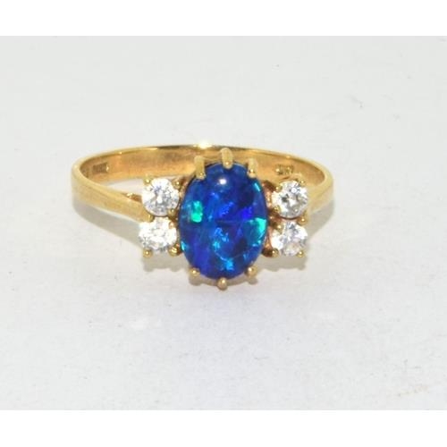 569 - 9ct gold ladies cabochon fiery Opal ring size N