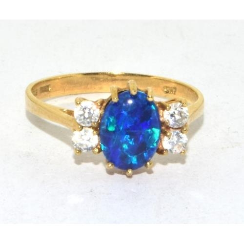 569 - 9ct gold ladies cabochon fiery Opal ring size N