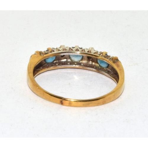 570 - 9ct gold ladies Diamond and Blue Topaz ring hallmarked as diamond in the ring size O