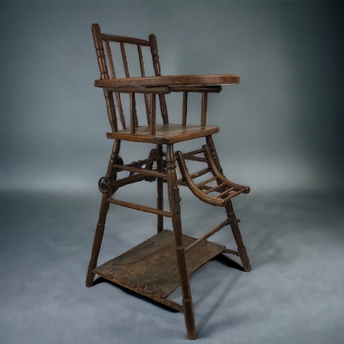 54 - A 19th Century French Childs Chair. Folds down to walker. With original wheels.