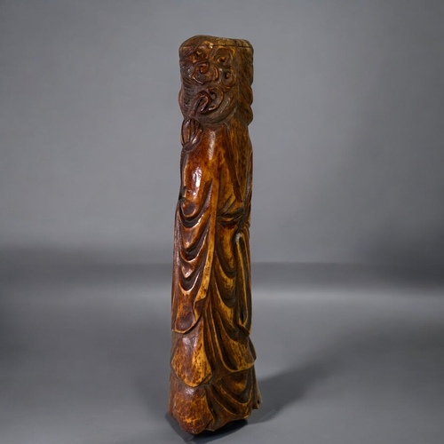 25 - A Chinese carved & stained bone carving.Qing dynasty, 19th century.Together with a brass bound b... 