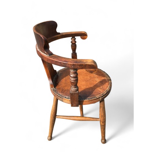 168 - Antique Beech Late 19th Century Smokers Bow Chair, having Leatherette and Studded upholstered circul... 