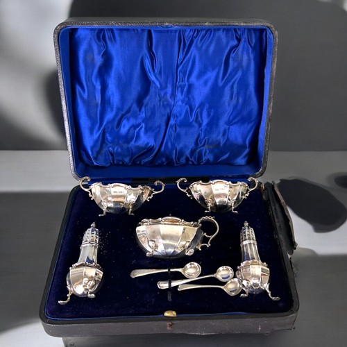 487 - A cased sterling silver condiment set.S Greenberg & Co -Israel Sigmond Greenberg, Birmingham. Wi... 