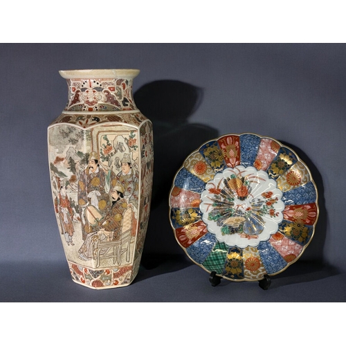 23 - A large Japanese Satsuma vase.Meiji period, 19th century.Hexagonal form, painted court scenes with s... 