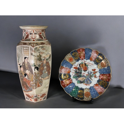 23 - A large Japanese Satsuma vase.Meiji period, 19th century.Hexagonal form, painted court scenes with s... 