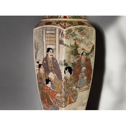 23 - A large Japanese Satsuma vase.Meiji period, 19th century.Hexagonal form, painted court scenes with s... 