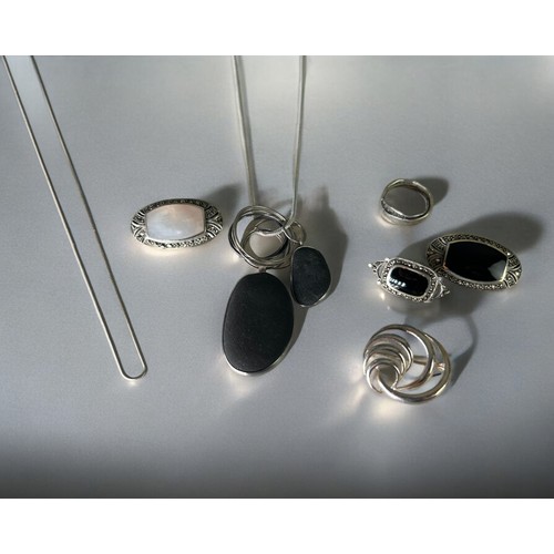 604 - A collection of jewellery. Including hallmarked silver & marcasite brooches, silver ring and sto... 