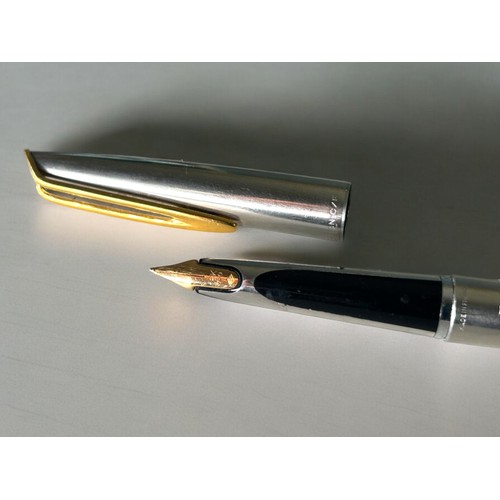 190 - A Waterman c/f 18ct gold nib together with two ball point pens. American Express ball point and a  P... 