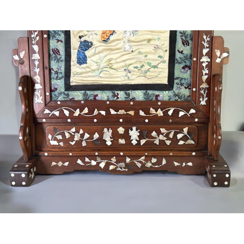 45 - A large Chinese Rosewood & mother-of-pearl inlaid screen.Fitted with Chinese silk embroidered pa... 