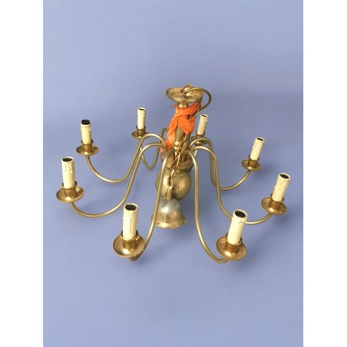 187 - An 8 branch and a 6 branch Brass Chandeliers with Faux Candle style Fittings. Both have the chain an... 