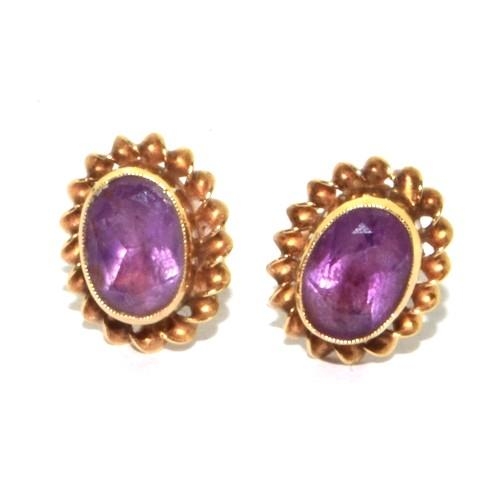 580 - 9ct gold vintage Amethyst stud earrings in a scroll setting