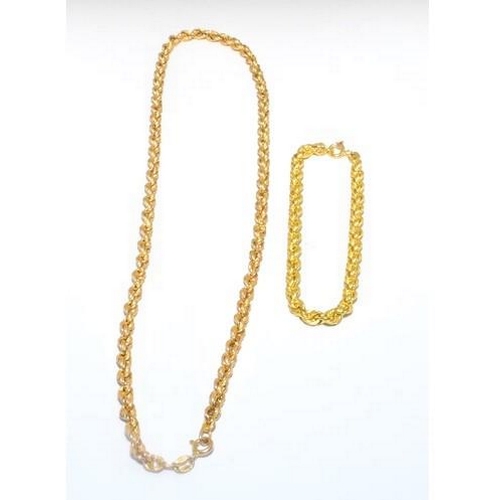 584 - 9ct gold rope neck chain 44cm long together with a matching bracelet 9g total