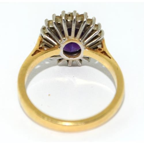 588 - Impressive Princess Diana style Amethyst and Diamond ring in 18ct gold ring has a hall mark as 4ct c... 