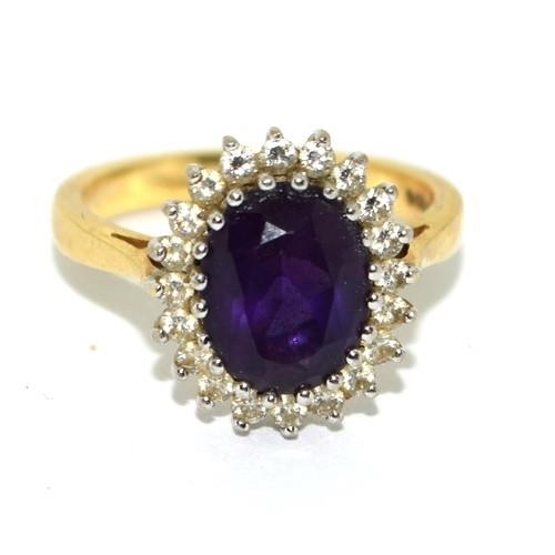 588 - Impressive Princess Diana style Amethyst and Diamond ring in 18ct gold ring has a hall mark as 4ct c... 