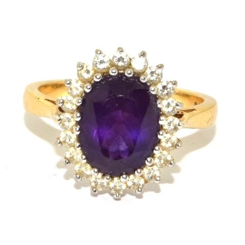 588 - Impressive Princess Diana style Amethyst and Diamond ring in 18ct gold ring has a hall mark as 4ct c... 