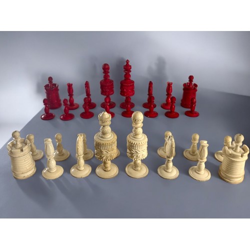 557 - A Victorian carved & stained bone chess set.English, 19th century.King height - 11.5cm... 