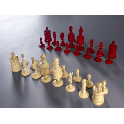 557 - A Victorian carved & stained bone chess set.English, 19th century.King height - 11.5cm... 