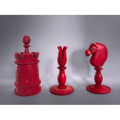 557 - A Victorian carved & stained bone chess set.English, 19th century.King height - 11.5cm... 