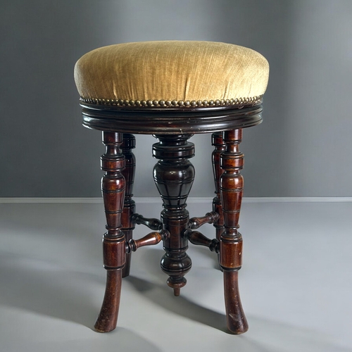 107 - A Victorian upholstered adjustable piano stool.Height - 55cm